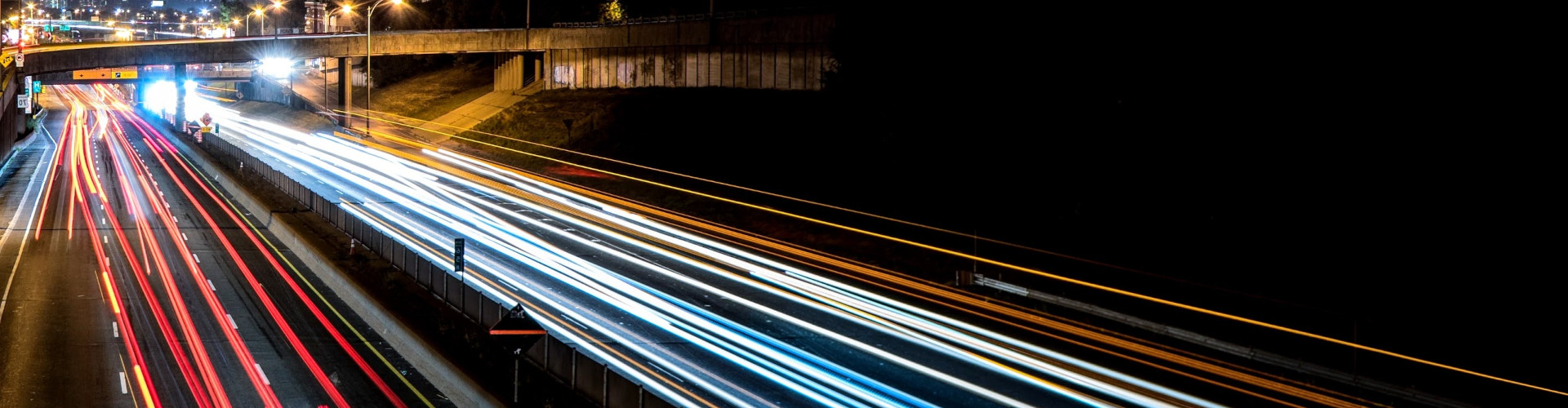 Car lights on long exposure at night
